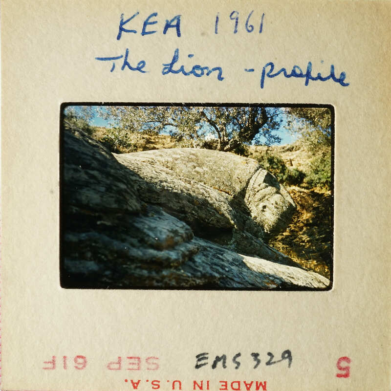 Rock formation with sunlight casting shadows and highlights.