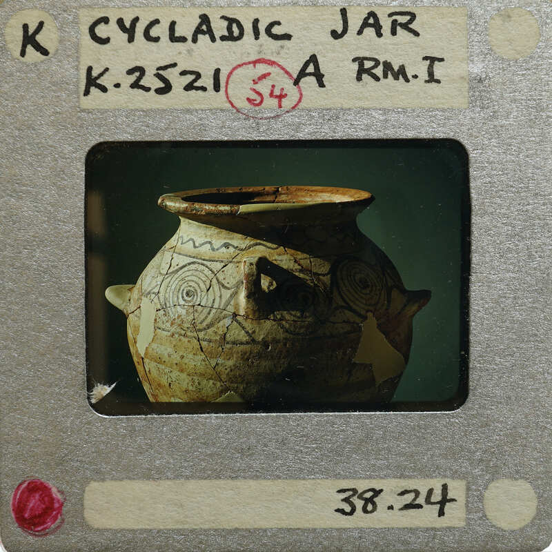 Multi handled reassembled jar (K.2521) with spiral and other decorations.