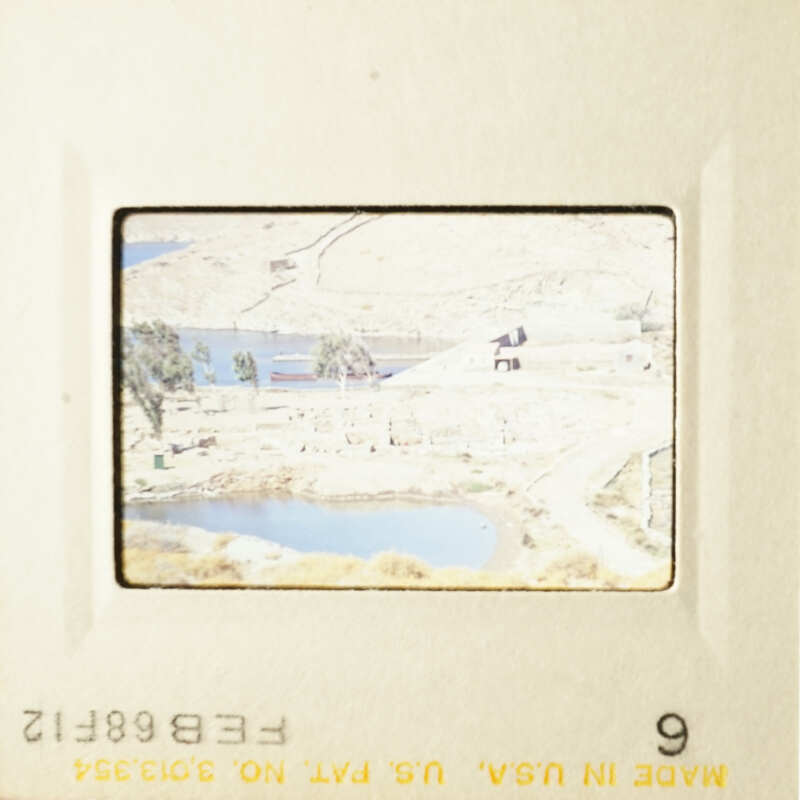 This is a photo of a scenic landscape with water and mountains visible.