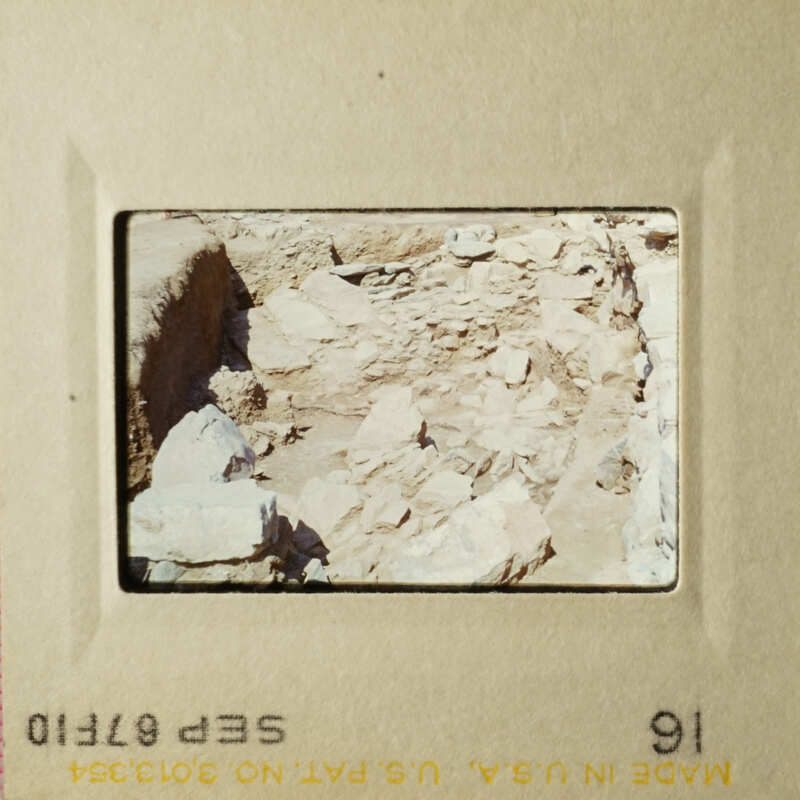 This is an image of a rocky landscape, likely an archaeological site, as seen through a microscope.