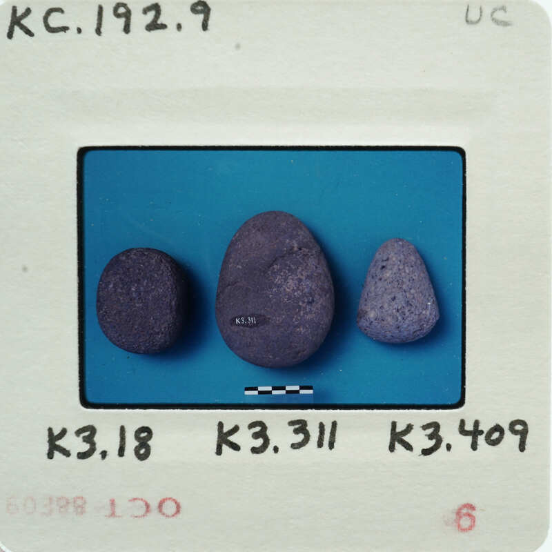 Three purple rocks on a blue background with labels and numbers.