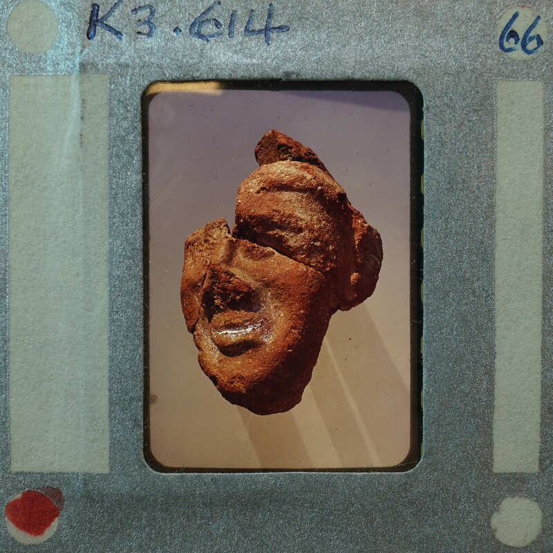 Terracotta figurine face fragments partially restored K3.614.