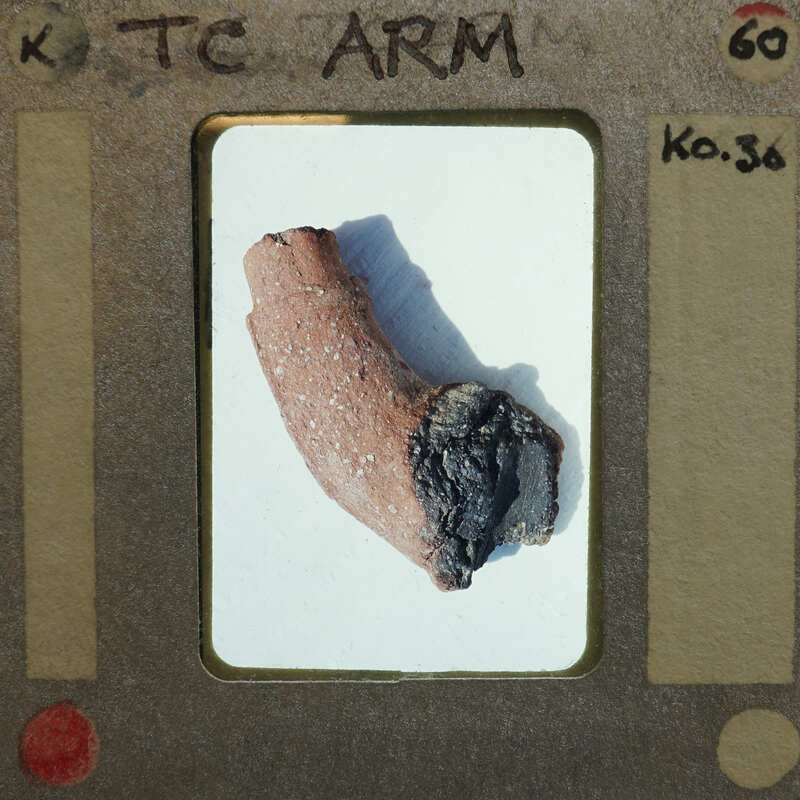Broken fragment of terracotta identified as an arm from a human figurine K0.30.