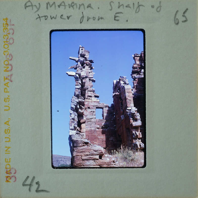 Old stone ruins with a clear sky background.