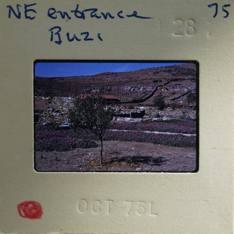 A vintage film strip with a photograph of a scenic landscape, possibly from the 1970s.