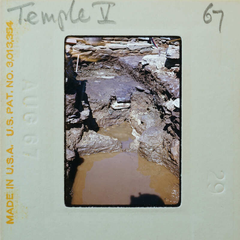 Excavated walls and flooded interior.