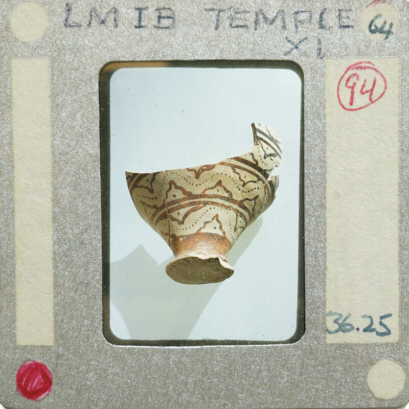 An ancient ceramic vase with intricate patterns.