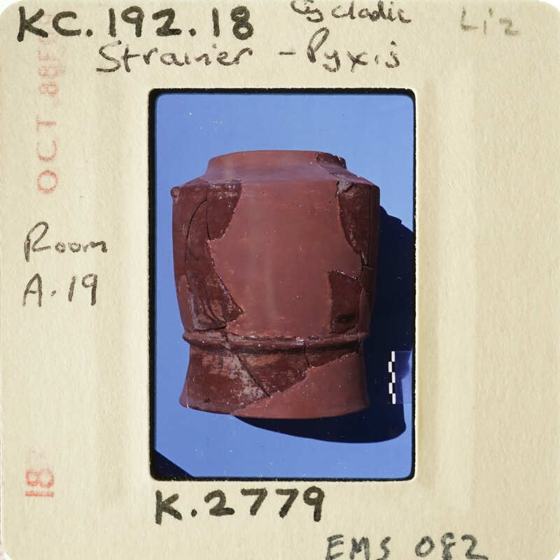 Ancient clay pot with visible cracks and imperfections.