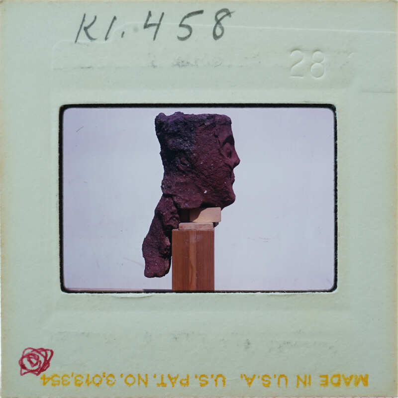 Terracotta figurine face from side K1.458.