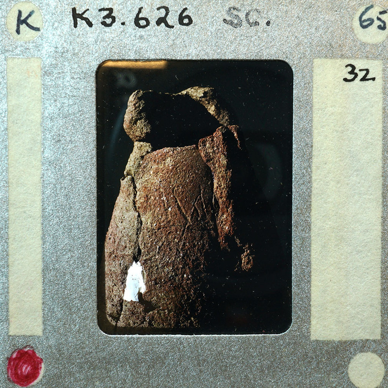 Partially reassembled terracotta figurine fragment of skirt K3.626.