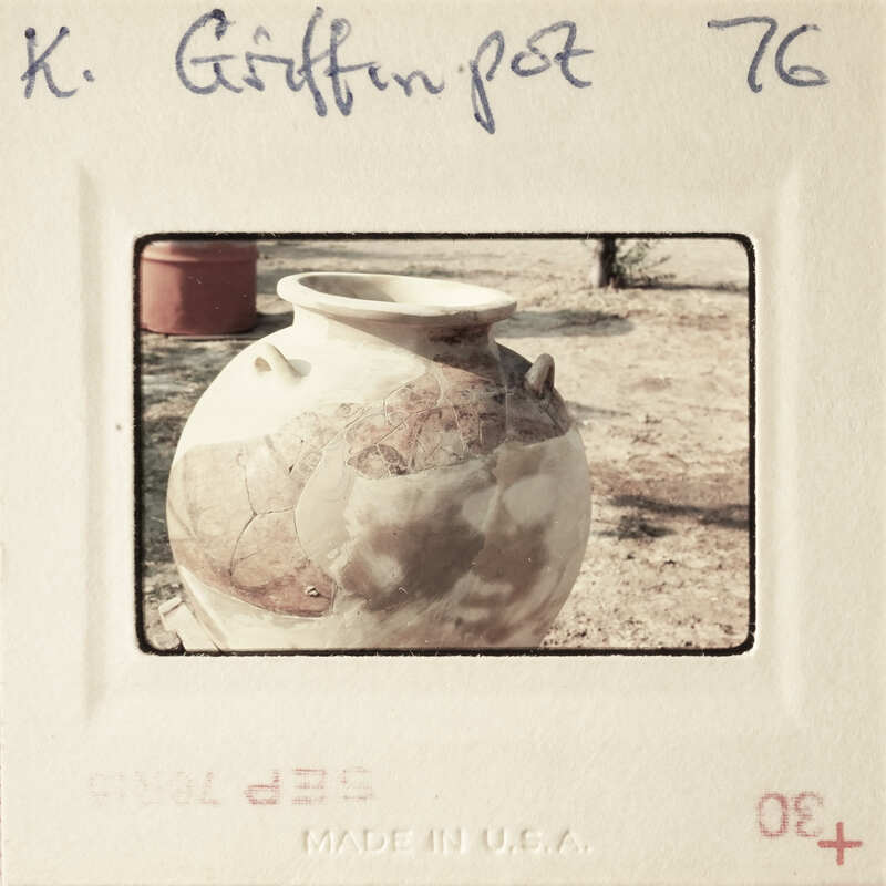 Old clay pot with map of Africa on it.