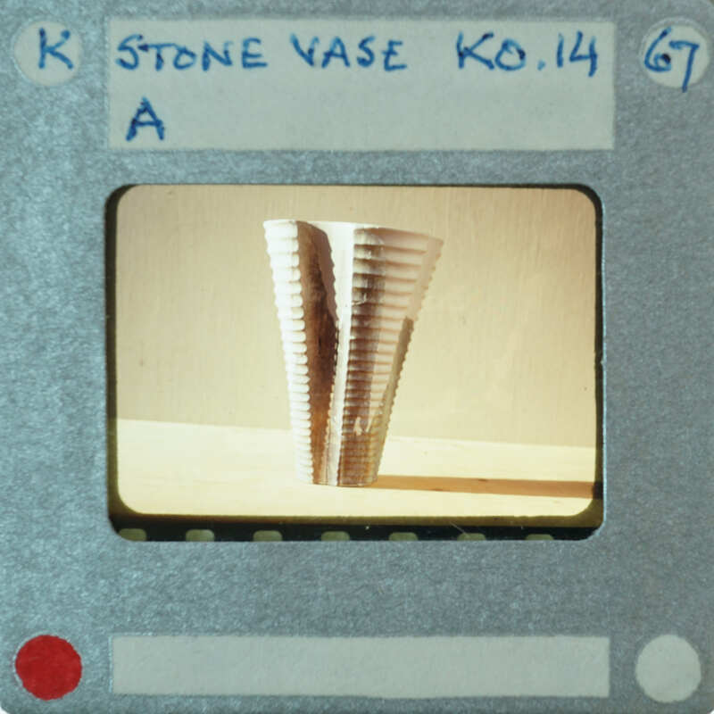 A photograph of a unique, three-dimensional sculpture on a table.