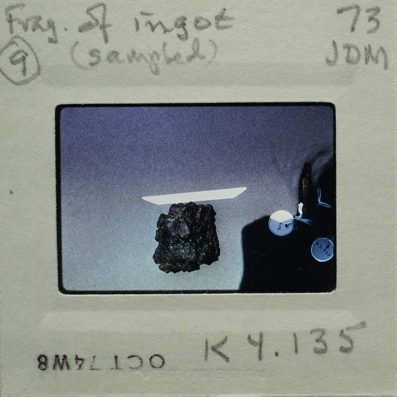 A photograph of a rock specimen on a table.