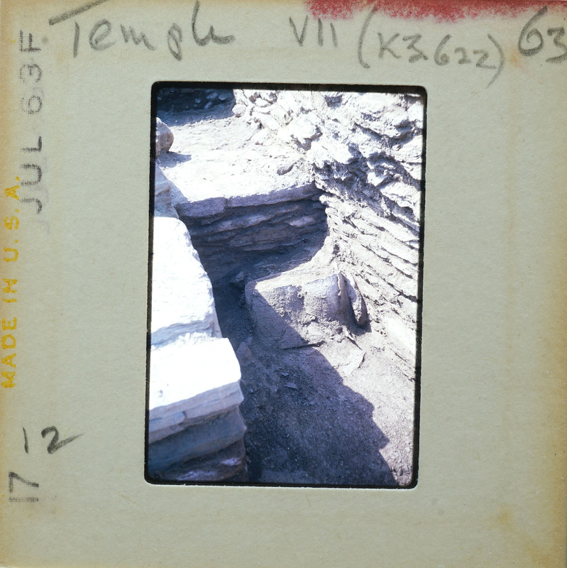 This is a photograph of an old stone structure, possibly ruins, with a focus on the texture and age of the stones.