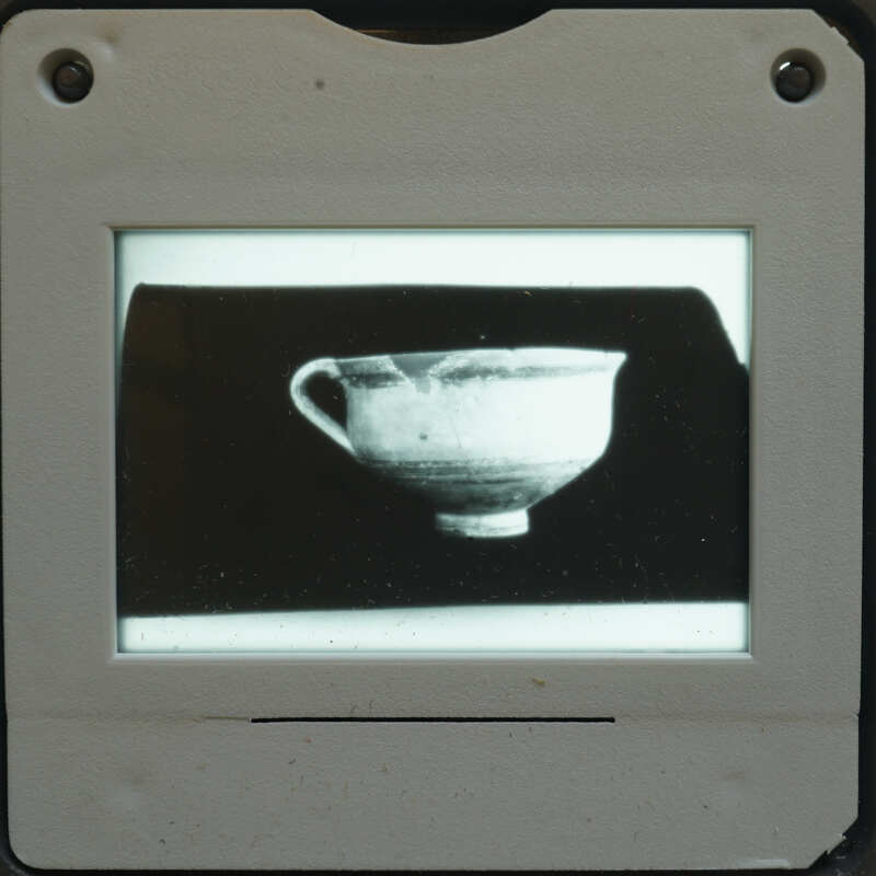 Slide of a photo print of a one handled cup.