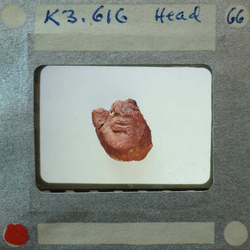 Terracotta figurine face fragment from front showing chin and lips K3.616.