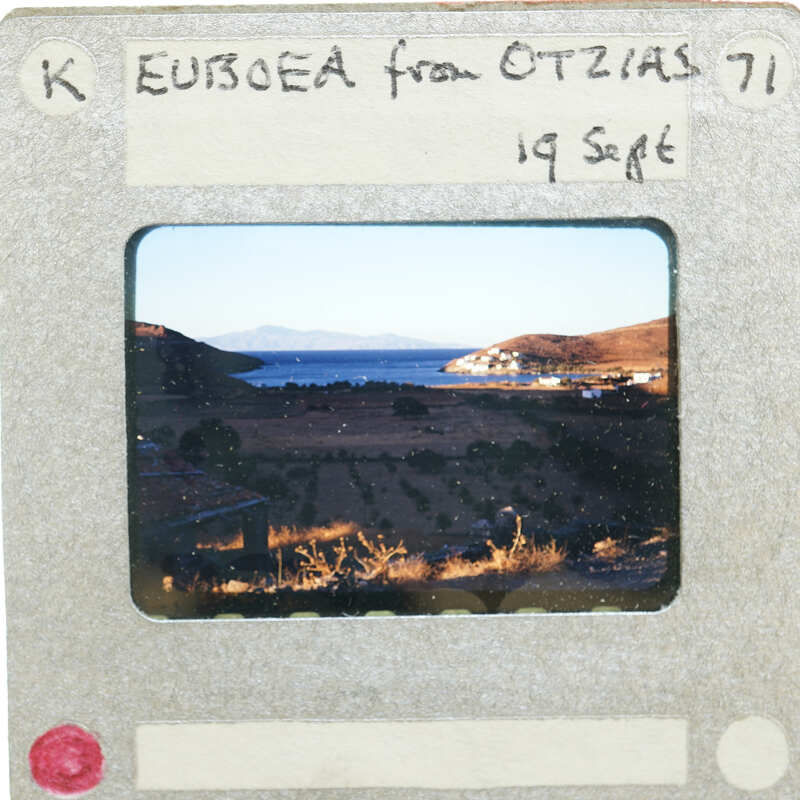 Photo of a landscape with a body of water and hills, taken on September 19th, 1971 from Europe.