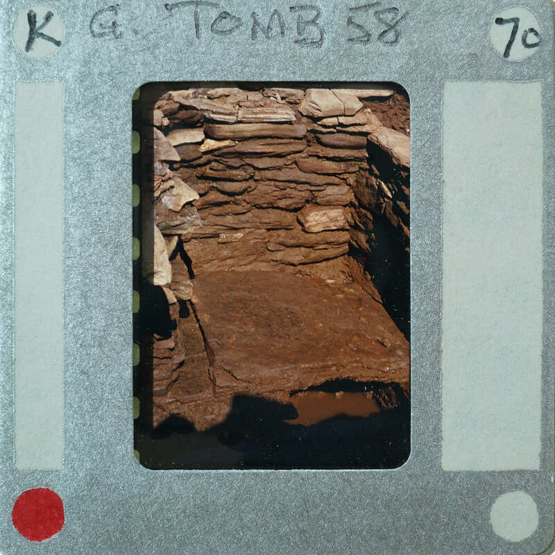 A photograph of a stone structure, possibly an old building or monument.