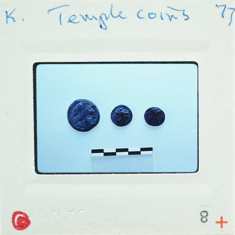 Image of a coin collection with labels and markings on the front.