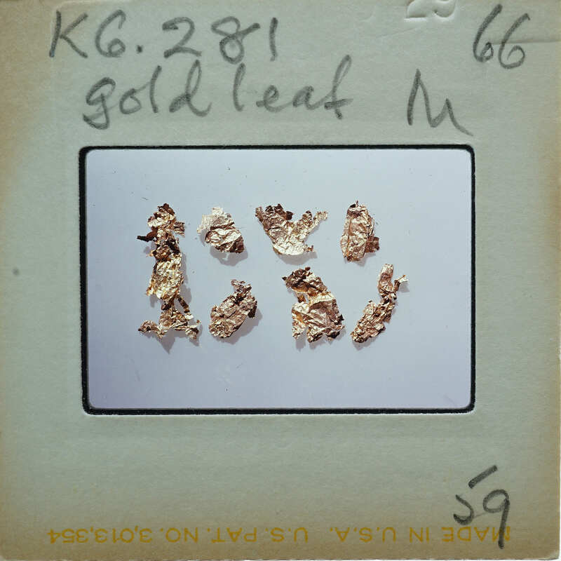 The image shows a collection of gold leaf samples on a white surface, with a label that reads "Gold Leaf M" and includes the number "6281".