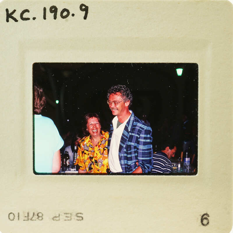 A man and woman posing together, with a Polaroid border around the photo. Catalog number KC.190.9