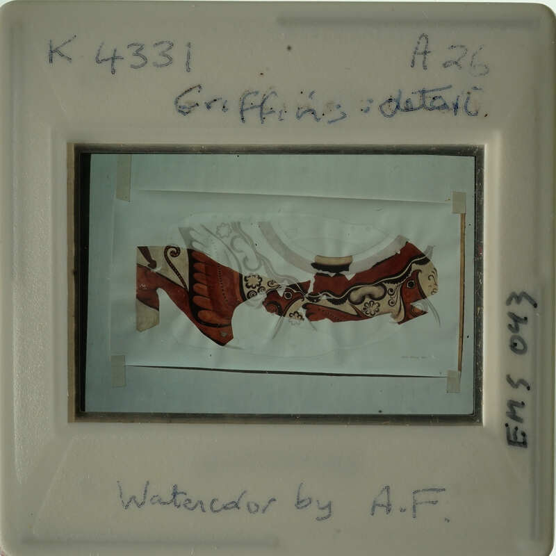 The image shows an ancient artifact with intricate designs, possibly a piece of pottery or textile, displayed against a white background.