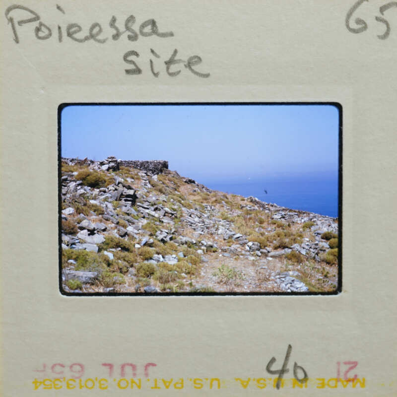 A photo of a rocky hillside overlooking the ocean.