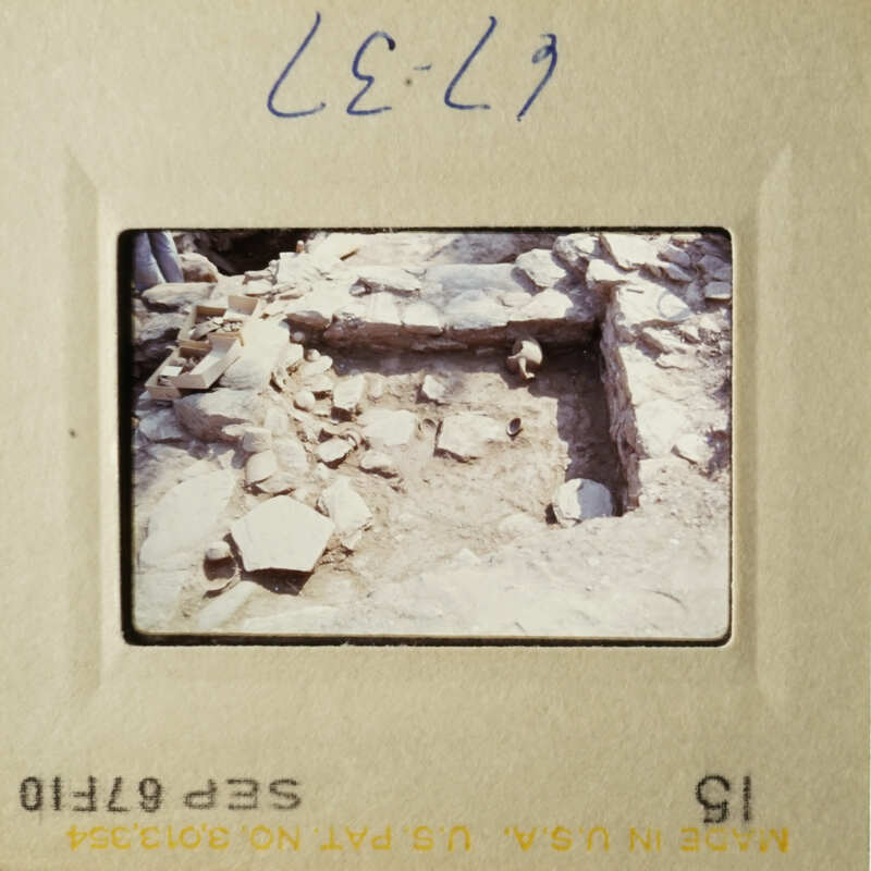 Two photos depicting historical ruins, with handwritten notes and a yellow sticker on the top right corner.