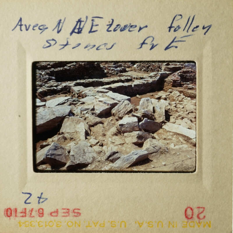 Old photos showcase rocky terrain and rubble, with handwritten notes indicating an archaeological site.