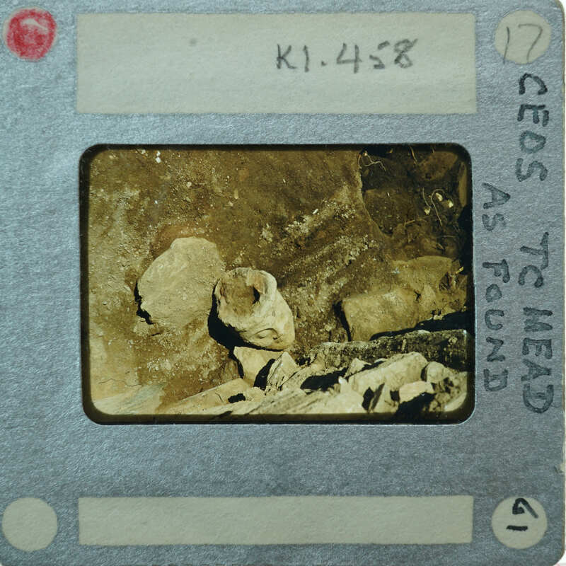 Terracotta figurine face as found the top K1.458.