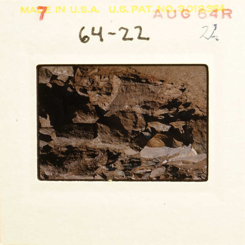 Rocky terrain with jagged edges and various textures.