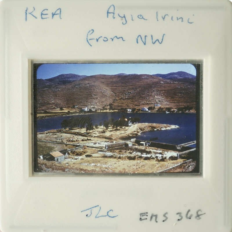 Scenic photograph with mountains and water, labeled "Kea Aya Irini from NW".