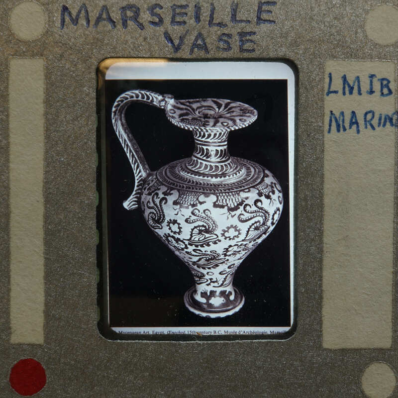 Single vase above profile showing intricate painted designs.