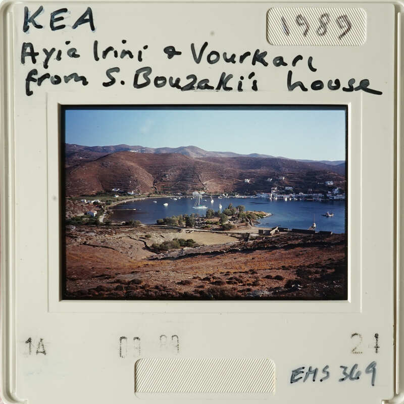 Scenic view of a lake with mountains in the background, as seen on an old photograph.