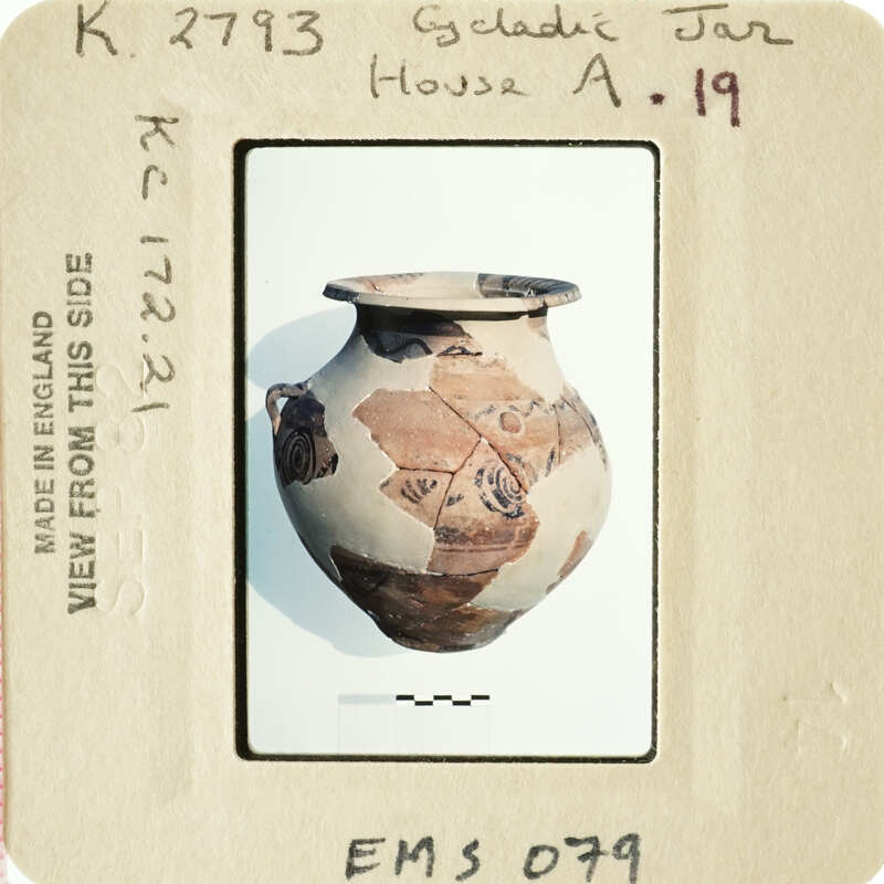 Ancient Greek vase with painted figures and patterns.