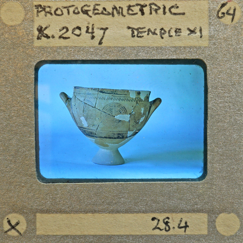 Reassembled bowl with swirl design in profile, K.2047.