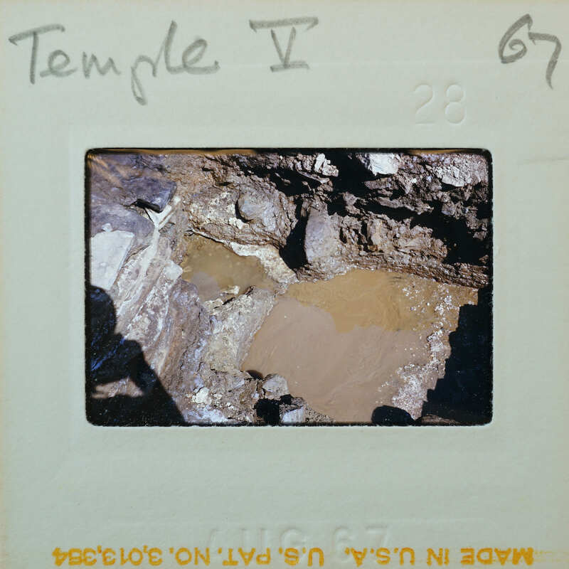 Stone walls and flooded floor.