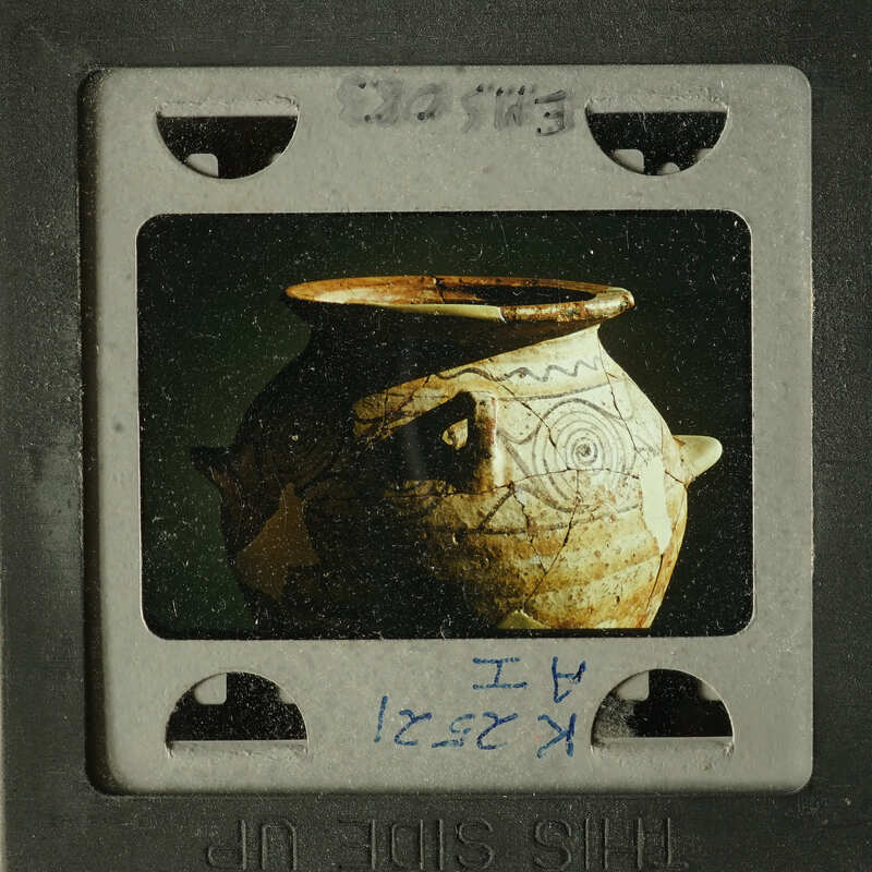 Ancient pottery with intricate designs on display.