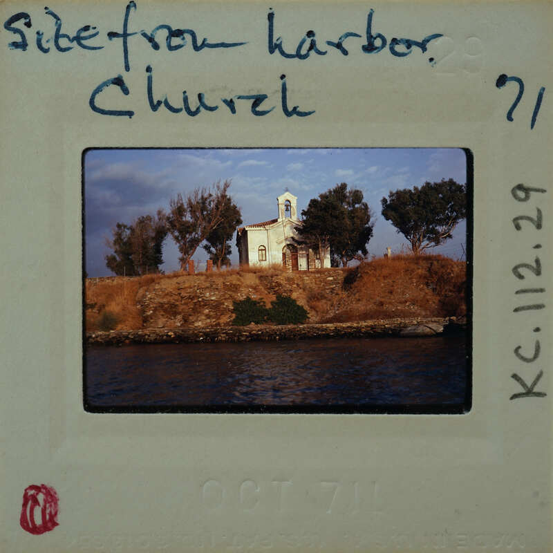 A photograph of a church with trees and water, marked as "Side View Harbor Church" on the film strip.