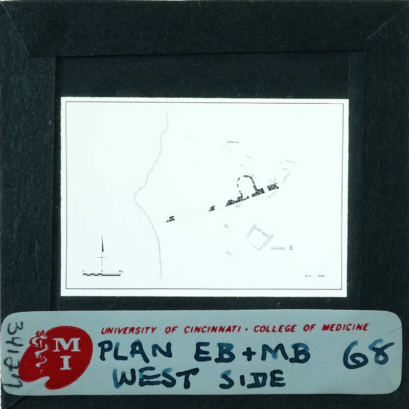 Photo of slide of drawing of walls labeled "Plan EB + MB West Side."