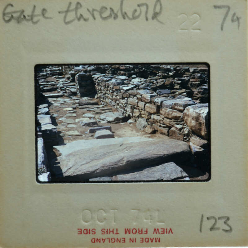 A photograph of an ancient stone structure with a visible date stamp on the bottom right corner.