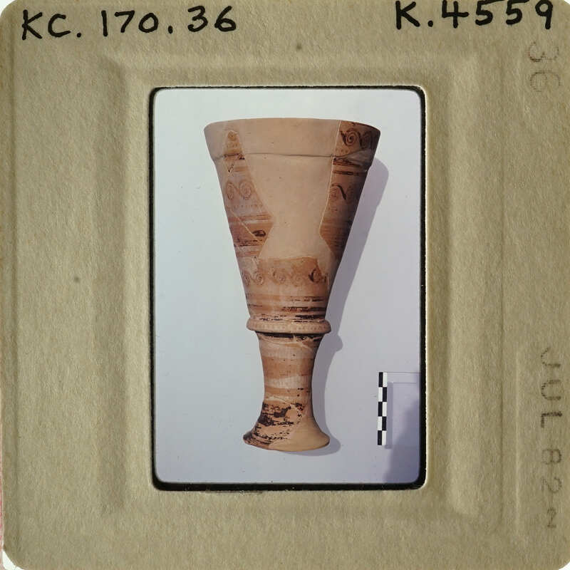 Ancient Greek vase with painted designs.