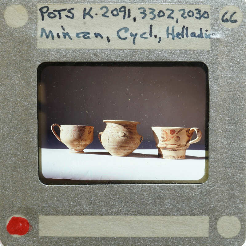 Three pots (K.2091, K.3302, K.2030) in profile on table.