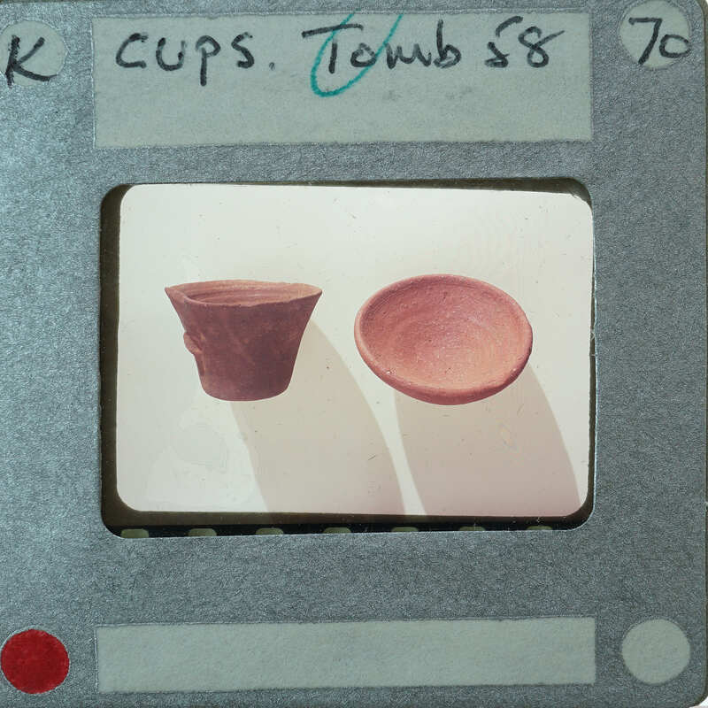 Image of two clay cups with a label and an X-ray film border.