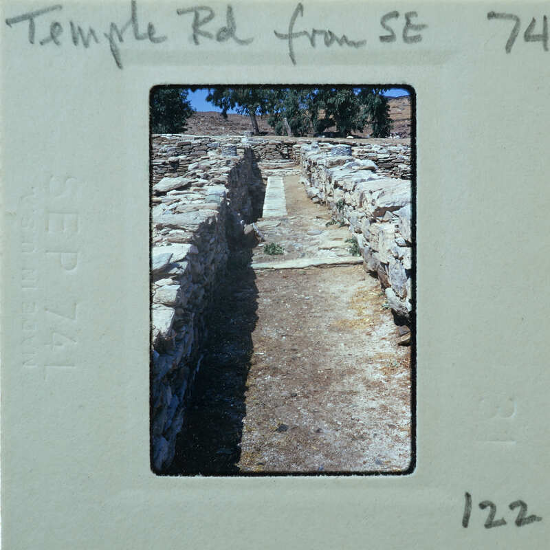 Parallel stone walls with surface between them.