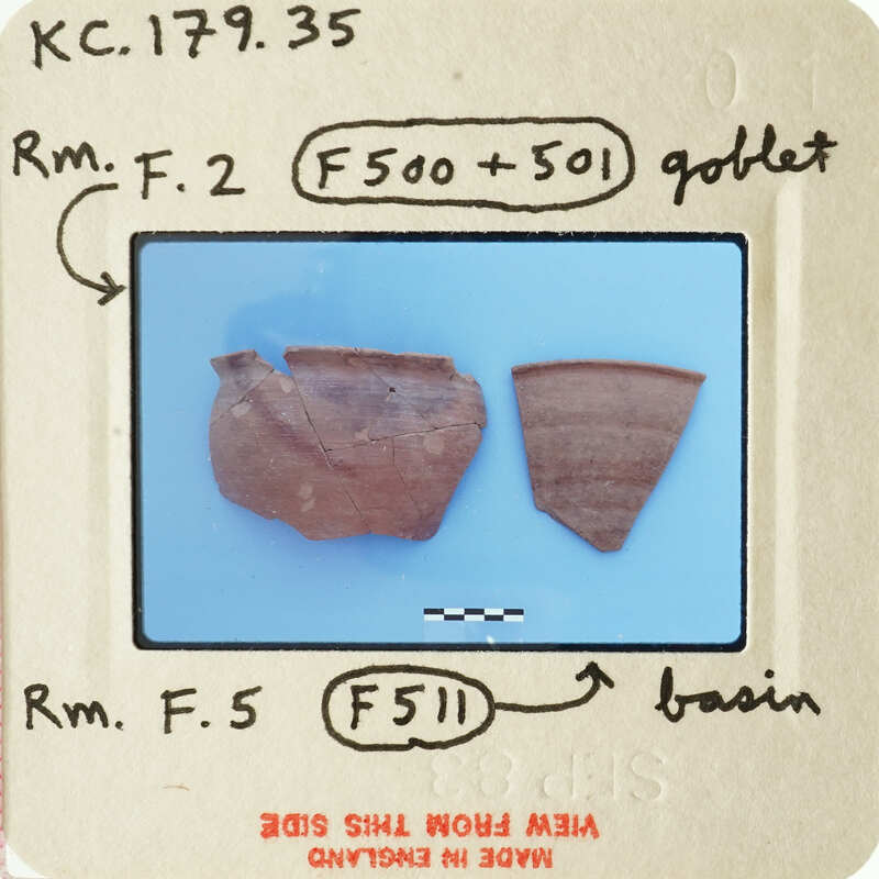 Two ancient pottery shards with annotations on a blue background.