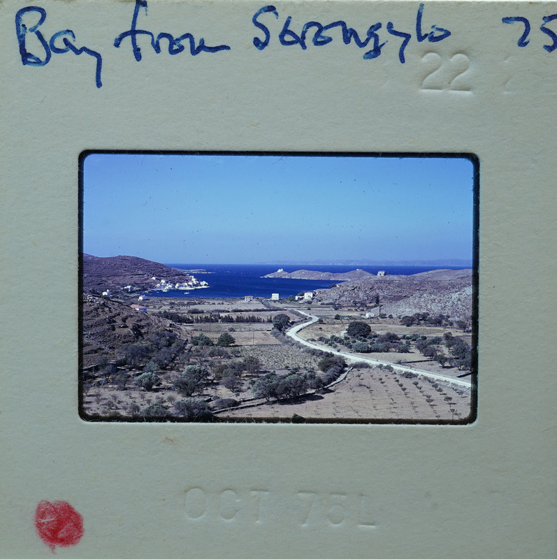 Photo of a scenic landscape with mountains, water, and vegetation, taken on October 29, 1976.