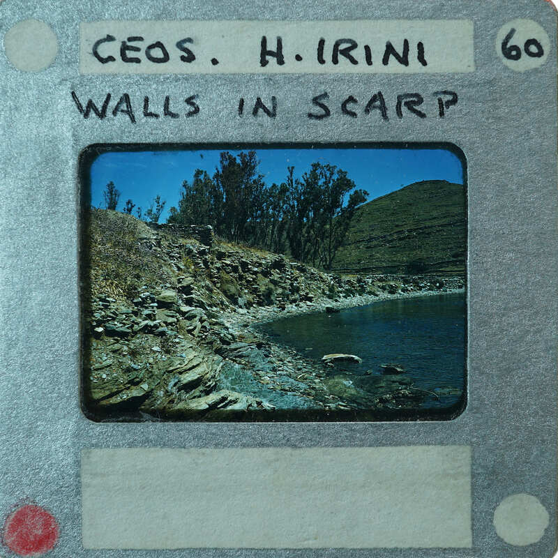 A scenic coastal area with rocks and water.