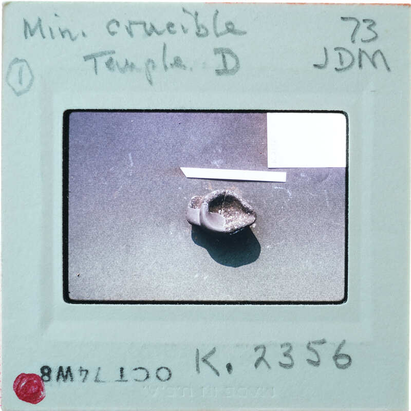 Closeup of very small reassembled pot, identified as a mini crucible K.2356.