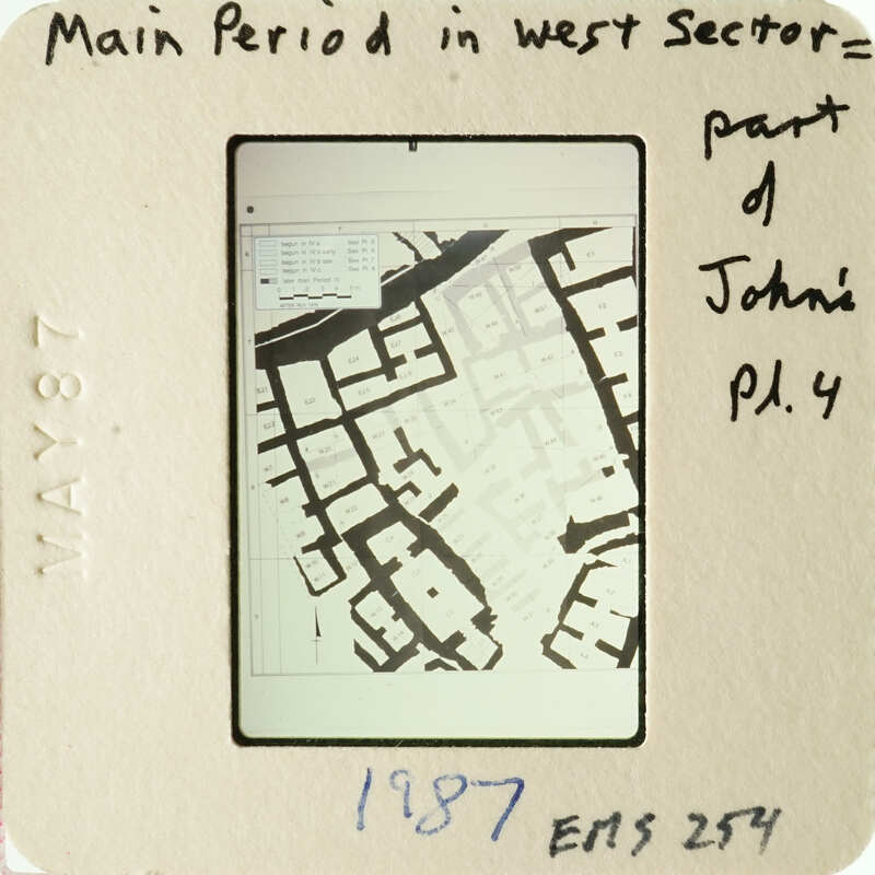 Black and white aerial photograph of an urban area with annotations.